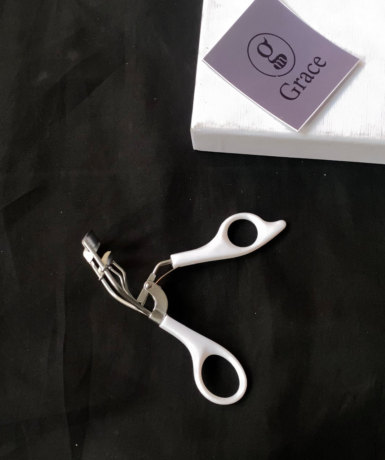 Eye lash curler